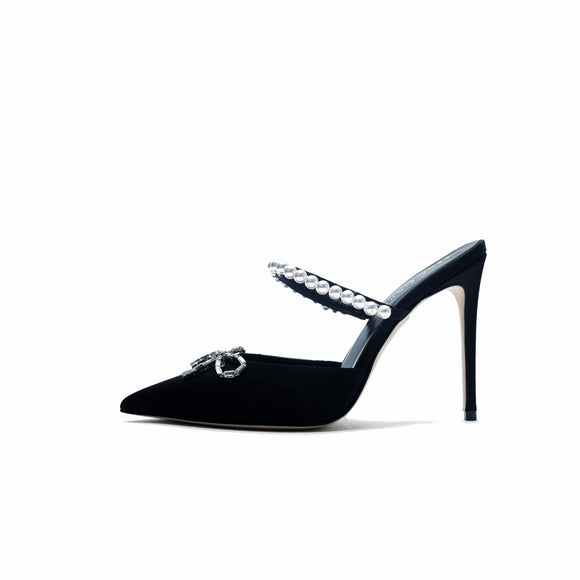 Zena Ziora luxury footwear capsule collection: Philippa pearl stiletto mule with crystal bow embellishment in black satin. Side view angle facing left. 