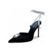 Zena Ziora luxury footwear capsule collection: The Dame pearl stiletto heel with crystal rectangular diamond embellishment in black satin. Diagonal view. 